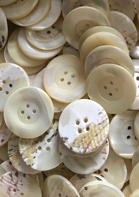 One Large Mother of Pearl Ivory 33mm 4H Buttons